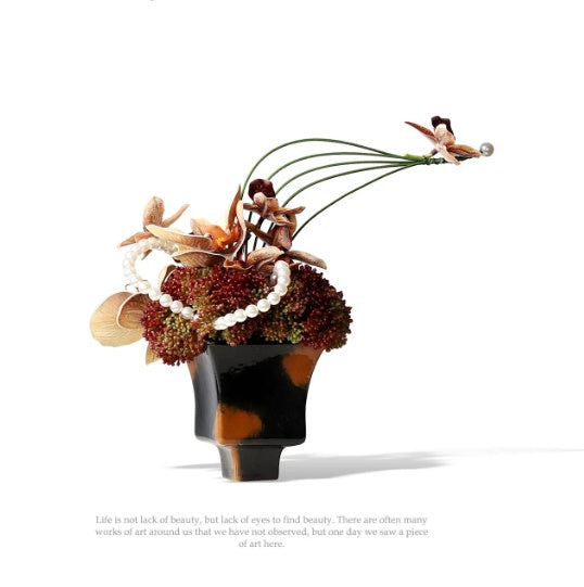 Small Ceramic Vase with Floral Arrangement for Home Decor