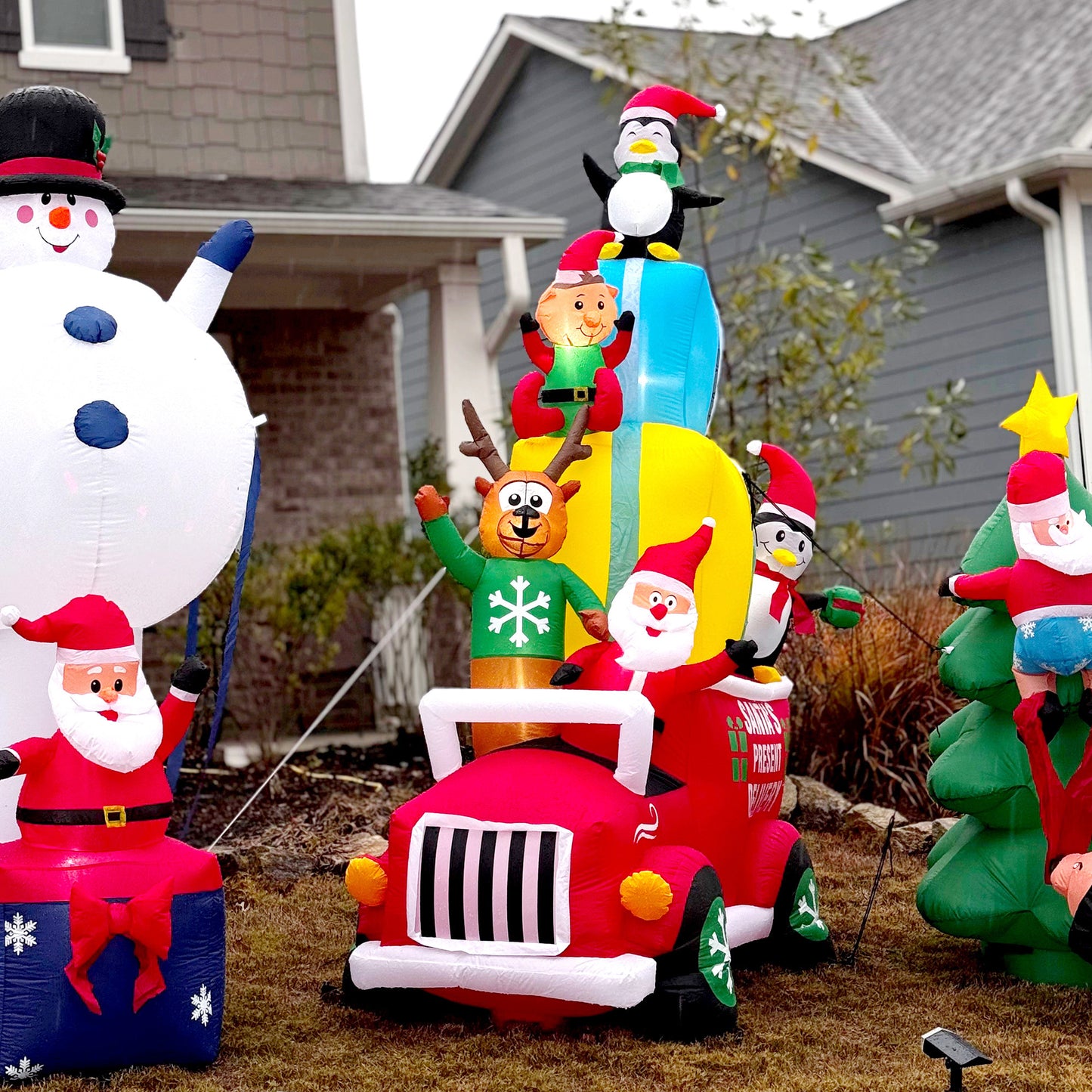 9ft Inflatable Santa Claus Gift Car with Elf, Elk & Penguins