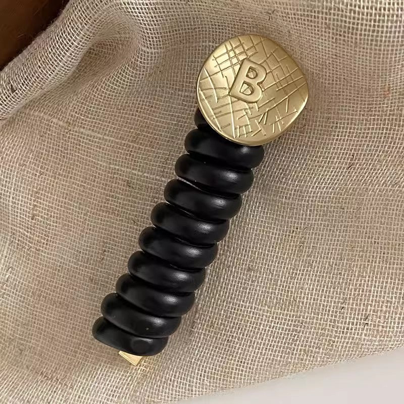 Ponytail Holder with Decorative Telephone Cord Design