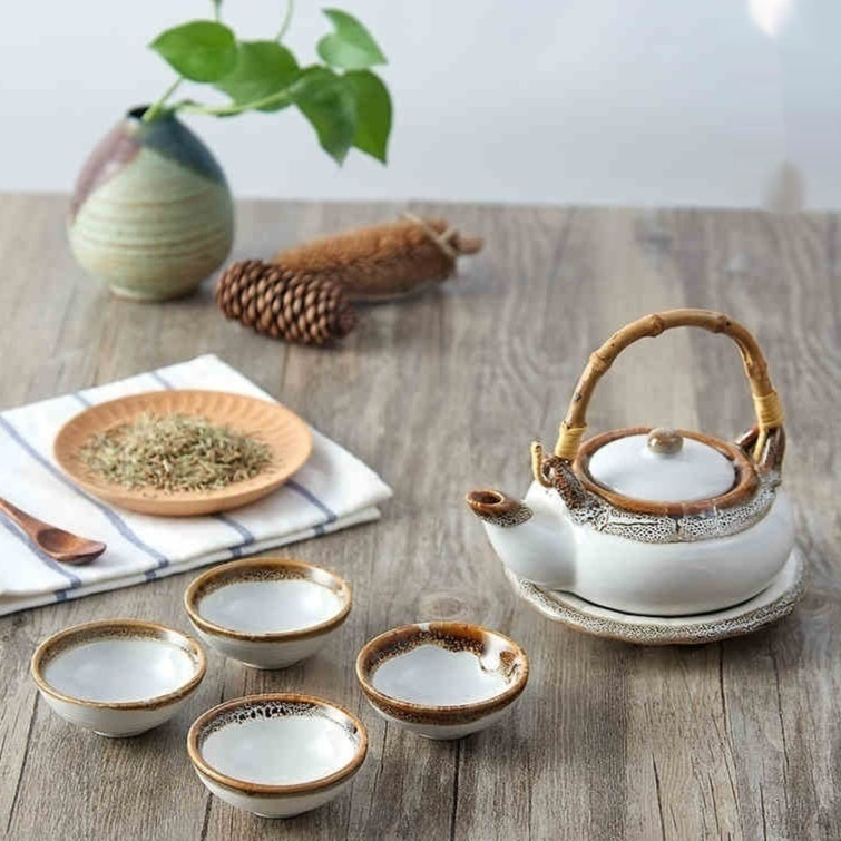 Japanese Style Porcelain Tea Set with Lifting Handle and Black Stone Design