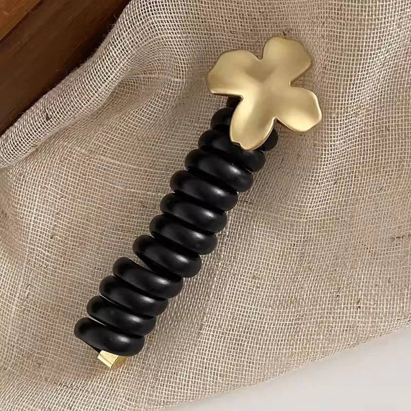 Ponytail Holder with Decorative Telephone Cord Design