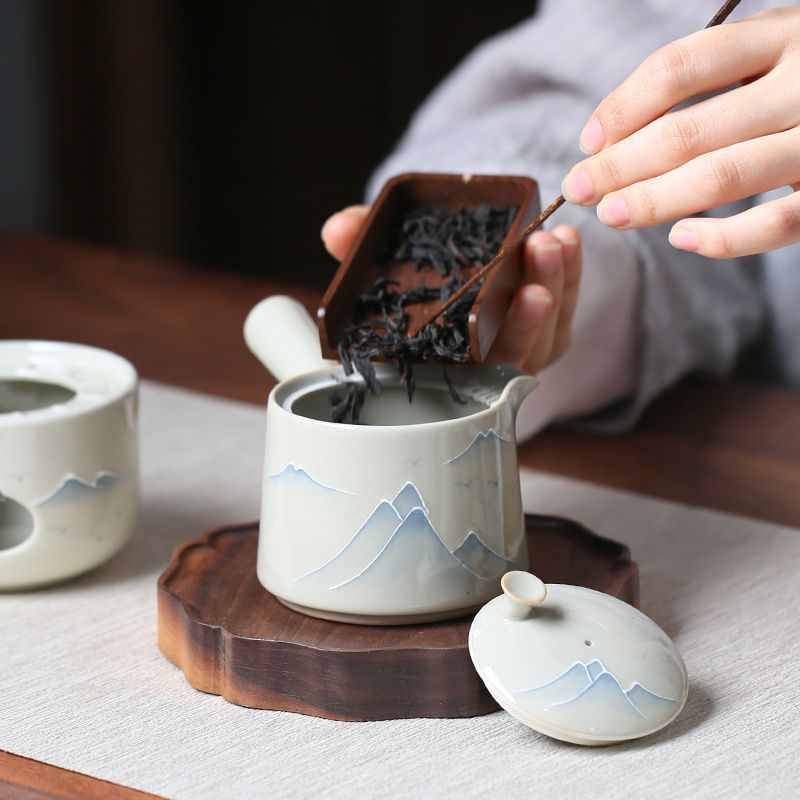 Hand-Painted Ceramic Tea Stove with Side Handle and Landscape Design