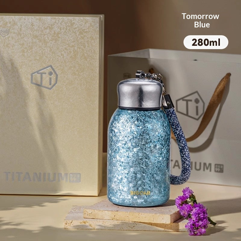 Insulated Water Bottle with Titanium Interior - Compact, Portable, Keeps Drinks Hot or Cold