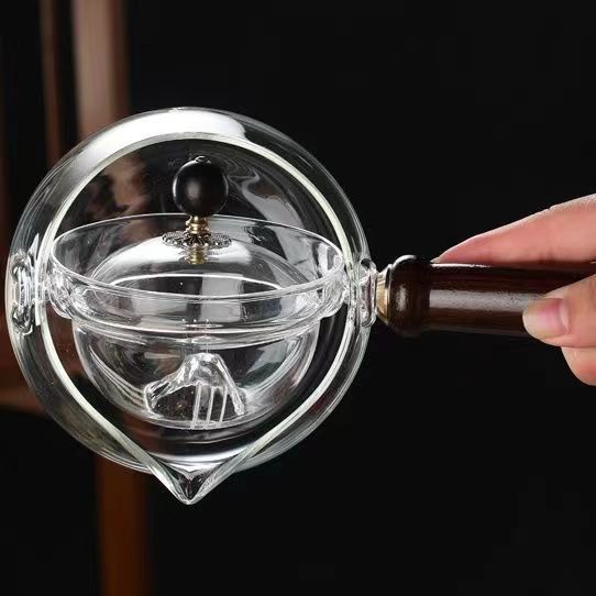 Automatic Revolving Thickened Tea Cooker with Heat-Resistant Glass and Multiple Cups