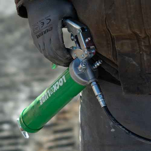 LockNLube Heavy-Duty Pistol Grip Grease Gun. Includes our patented LockNLube¢ç Grease Coupler (Locks On, Stays On, Won't Leak!) plus a high-quality 20" hose and in-line hose swivel