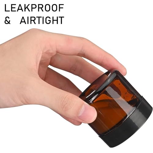 24 Pack 2 oz Round Amber Glass Cosmetic Jars with Inner Liners and Black Lids, Travel Jars, Refillable Containers for Makeup, Cream, Lotion, Sugar Scrubs, Eye Shadow, Slime, Paint, Jewelry