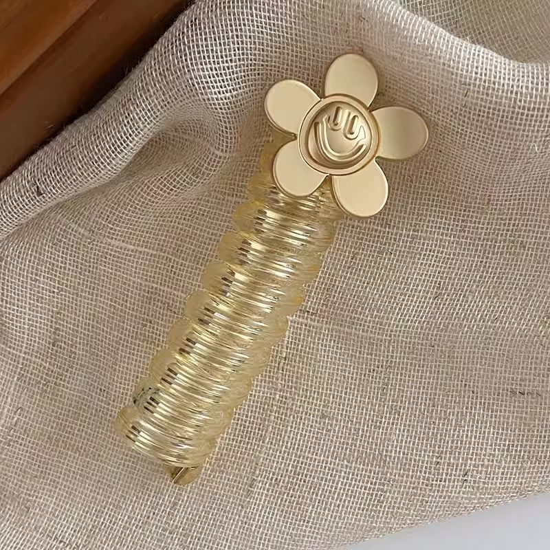 Ponytail Holder with Decorative Telephone Cord Design