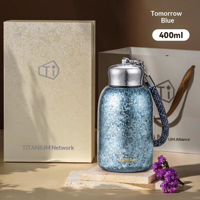 Insulated Water Bottle with Titanium Interior - Compact, Portable, Keeps Drinks Hot or Cold