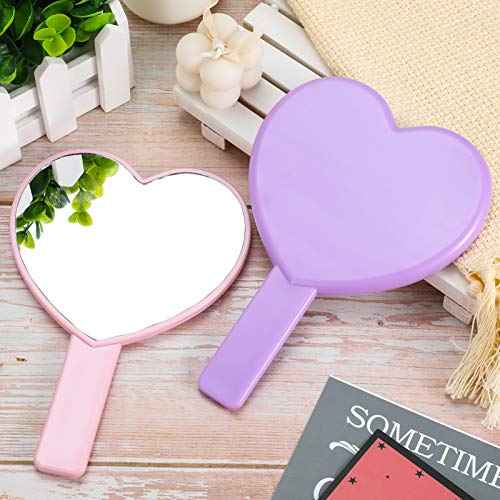 Jetec 2 Pieces Heart Shaped Handheld Cosmetic Mirrors Mini Travel Makeup Mirrors with Handle Small Heart Decorative for Women(Pink, Purple)