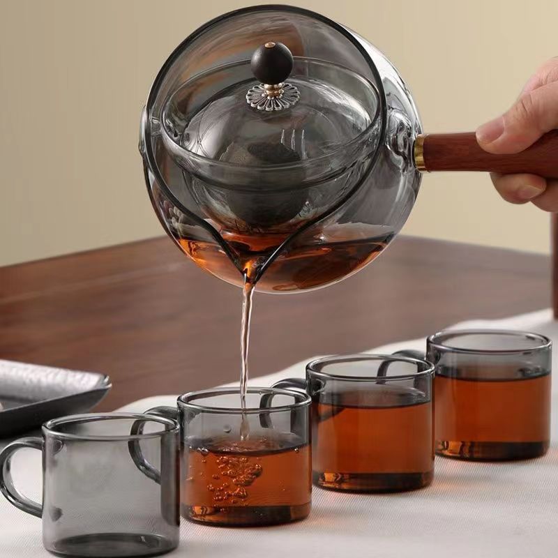 Automatic Revolving Thickened Tea Cooker with Heat-Resistant Glass and Multiple Cups