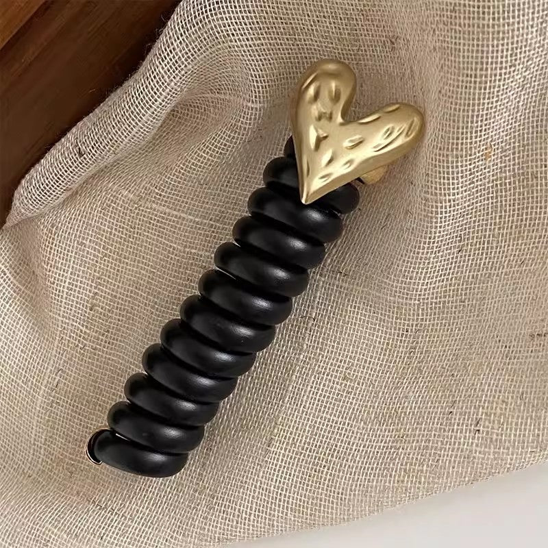 Ponytail Holder with Decorative Telephone Cord Design