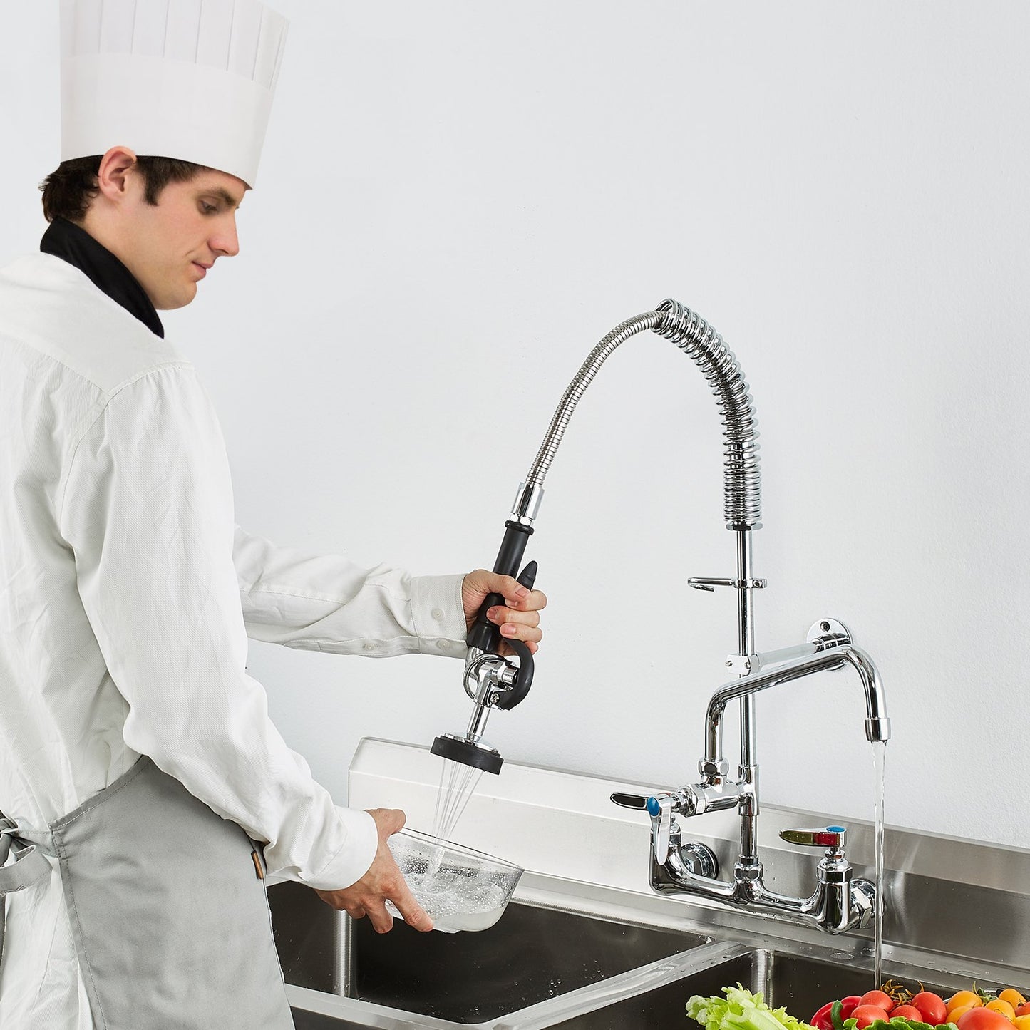 Wall-Mounted Commercial Faucet with Pre-Rinse Sprayer - 25" Height