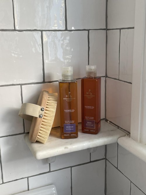 Aromatherapy Associates Mini Shower Oil Travel & Discovery Collection. 4 Premium Shower Oils (50ml each) and Handy Travel Case. Includes Revive, De-Stress, Muscle and Rose Blends (1 count)