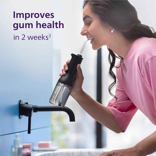 Philips Sonicare Cordless Power Flosser 3000 - Water Flosser with Innovative Quad Stream Technology, Oral Irrigator with 2 Flossing Modes and 3 Pressure Levels, IPX7 Waterproof, Black, HX3826/23