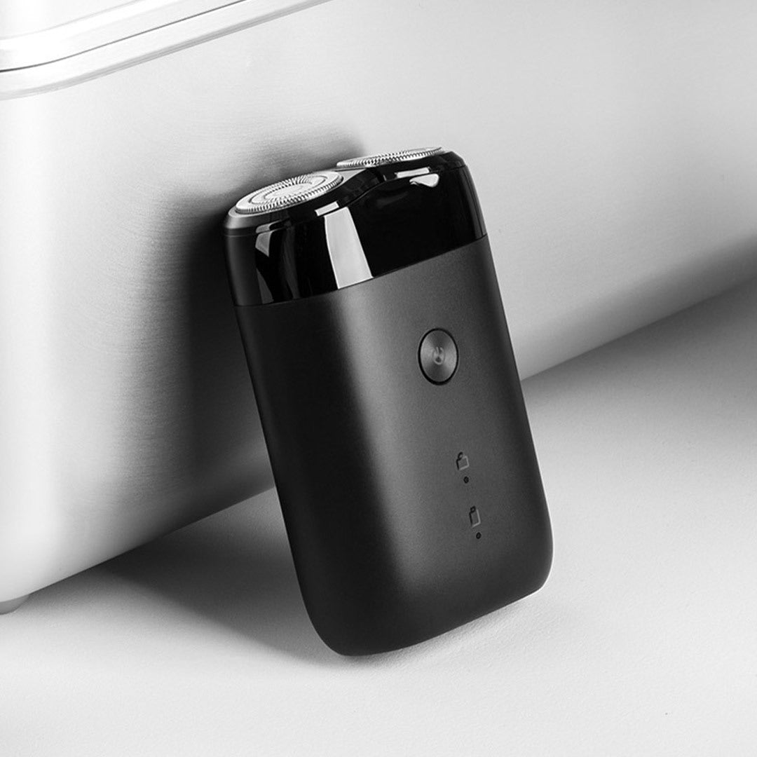 Electric Shaver with Rotating Double Cutter Head