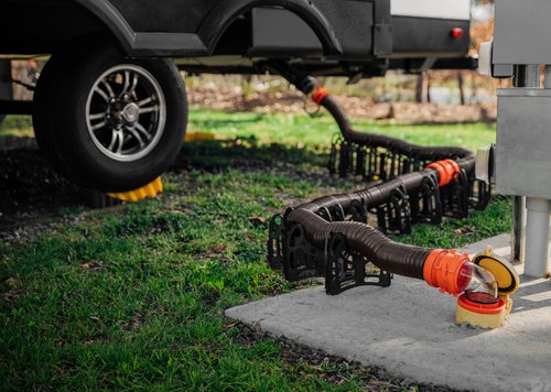 Camco Rhino RV Sewer Hose Kit - Includes RhinoFLEX 20-ft Sewer Hose & Sidewinder 20-ft Sewer Hose Support - Superior RV Tank Dumping (39799)