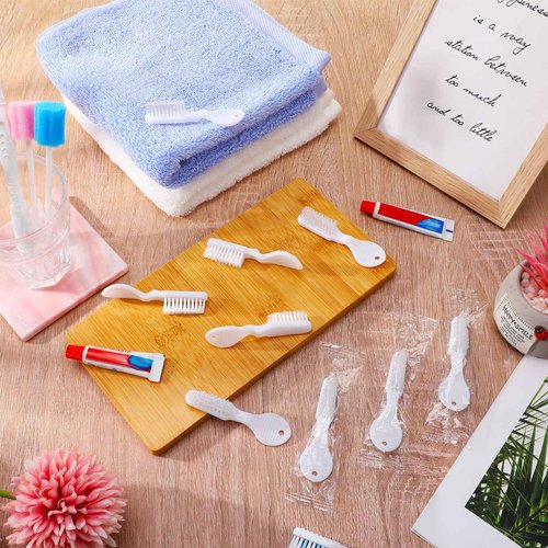Nuogo 500 Pieces Mini Toothbrush Bulk Disposable Toothbrushes Thumbprint Individually Packaged Security Toothbrush with Short Handle Soft Bristles Prison Tooth Brush for Camping Travel