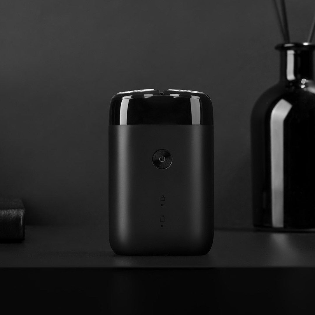 Electric Shaver with Rotating Double Cutter Head