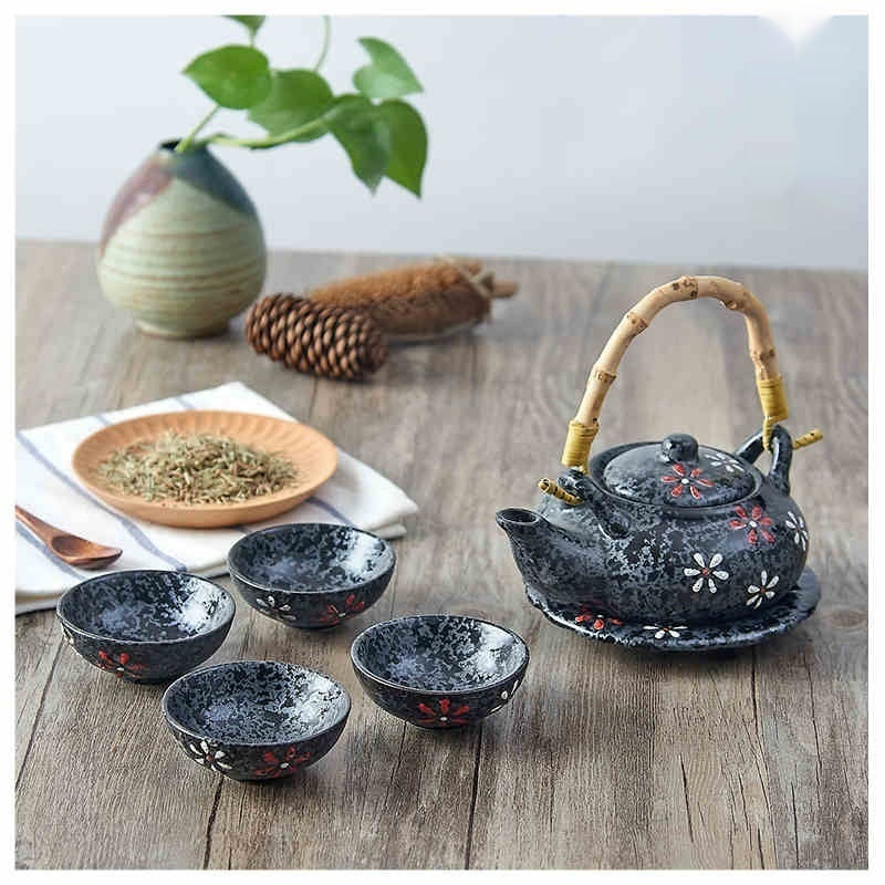 Japanese Style Porcelain Tea Set with Lifting Handle and Black Stone Design
