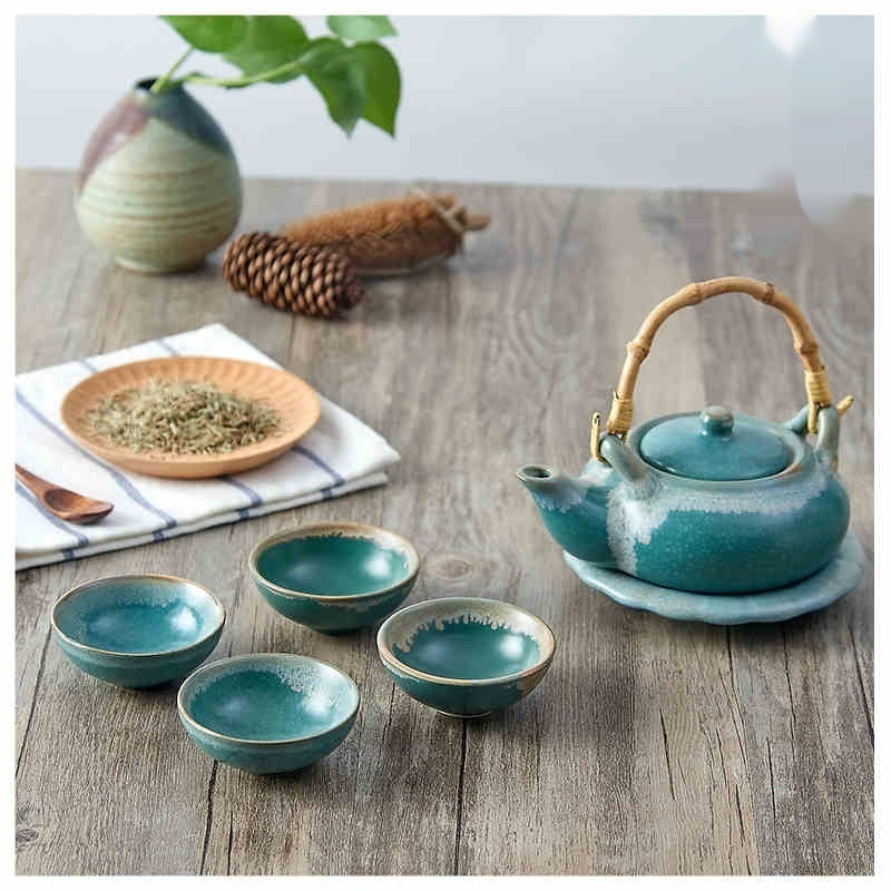 Japanese Style Porcelain Tea Set with Lifting Handle and Black Stone Design