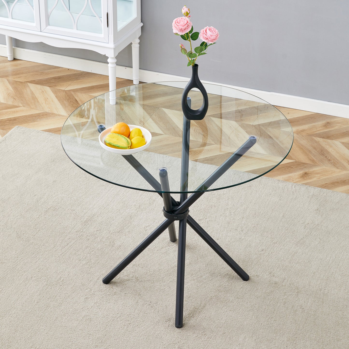 A Circular Transparent Tempered Glass Round Table With Diameter Of