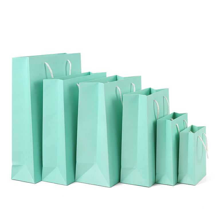Handheld Cowhide Christmas Gift Bag - Customizable Home Packaging