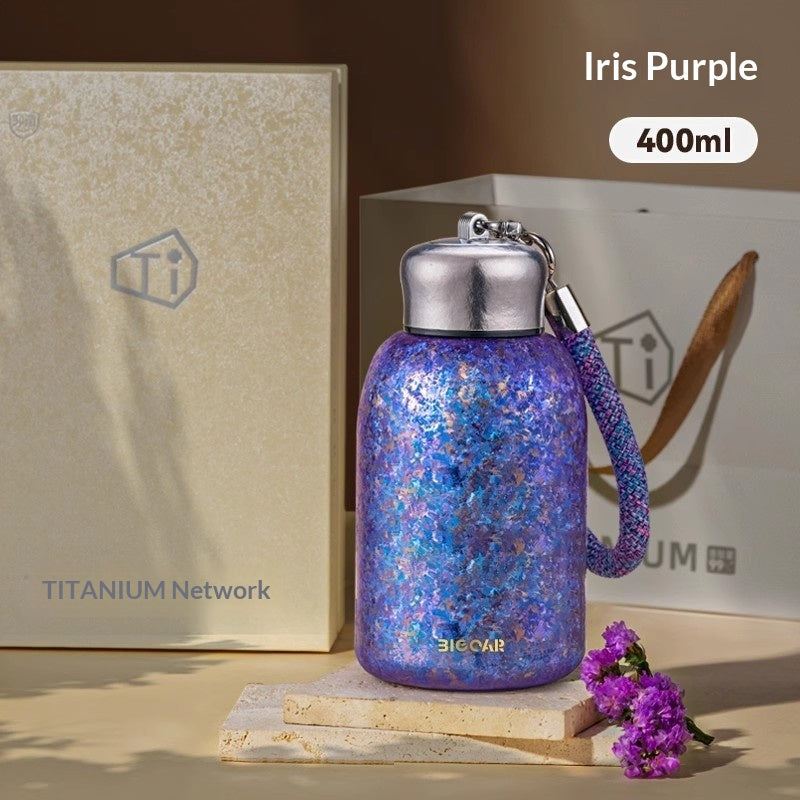 Insulated Water Bottle with Titanium Interior - Compact, Portable, Keeps Drinks Hot or Cold