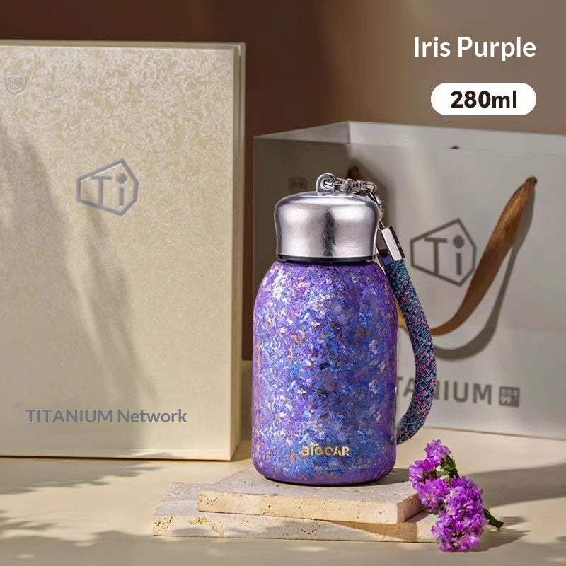 Insulated Water Bottle with Titanium Interior - Compact, Portable, Keeps Drinks Hot or Cold