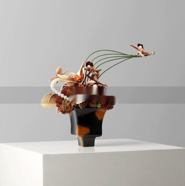 Small Ceramic Vase with Floral Arrangement for Home Decor