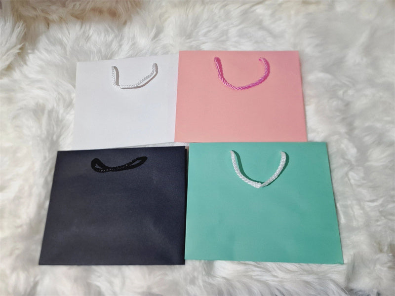 Handheld Cowhide Christmas Gift Bag - Customizable Home Packaging